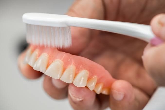 Professional denture cleaning at Pristine Dental Raipur